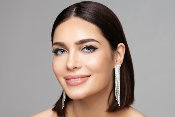 smiling woman with bob haircut