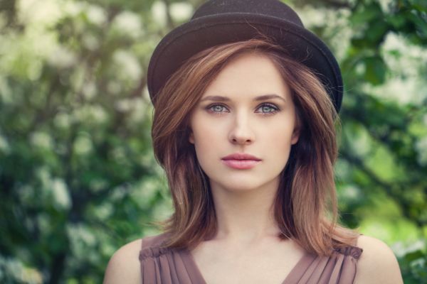 woman wearing hat outdoors